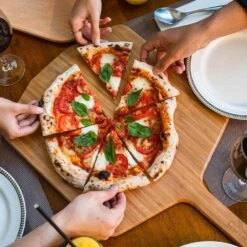 Ooni Bamboo Pizza Peel & Serving Board -Nomad s Choice 1259965 bamboo pizza peel serving board